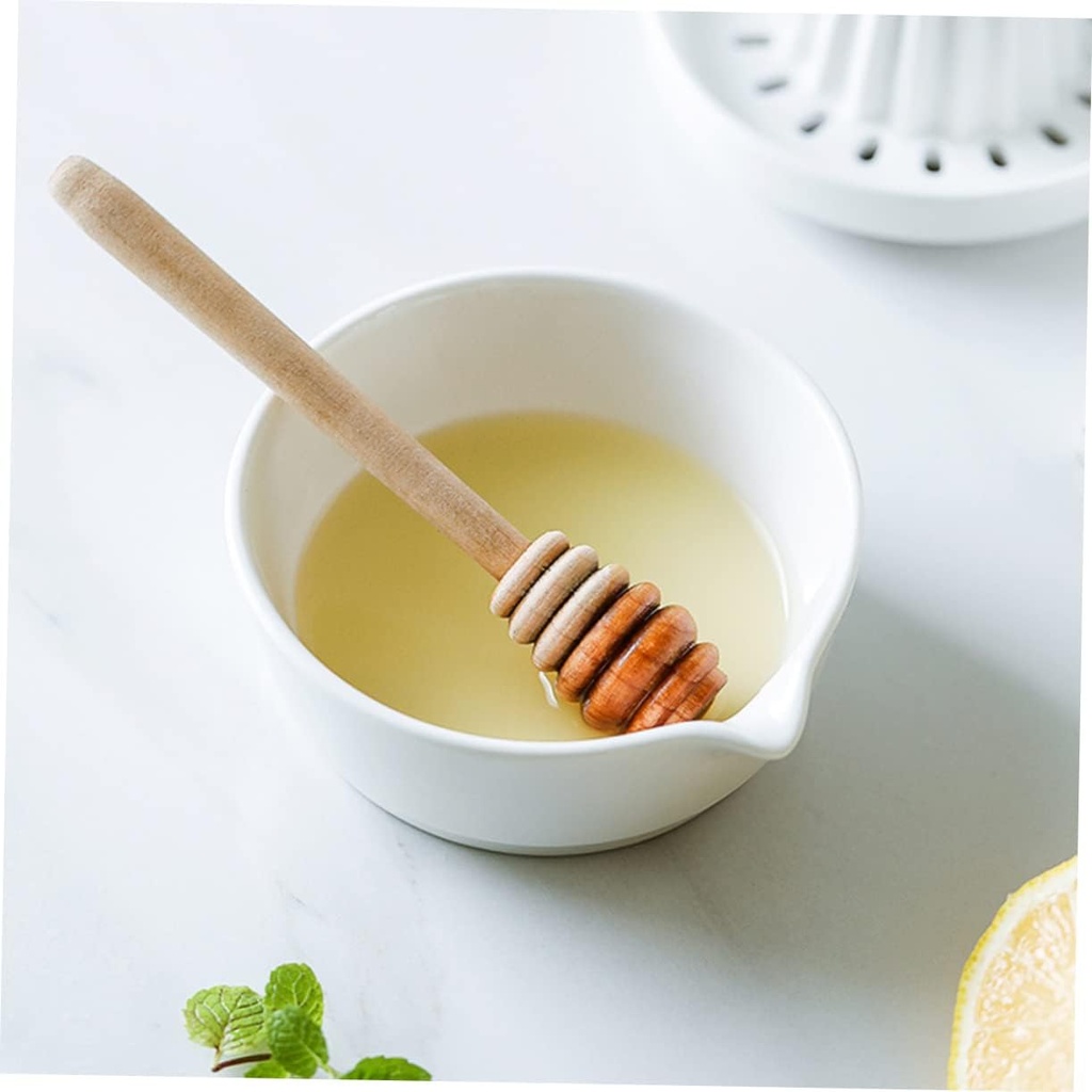 ceramic-manual-fruit-juicer-orange-squee-2.jpg